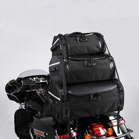 The stackable tail bag, 4 G-Hooks straps, Side straps, Sissy Bar Strap secure attachment system, no tools needed, very easy to attach to Harley-Davidson.